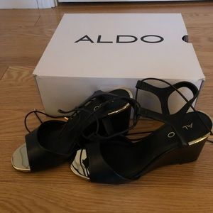 ALDO BLACK AND GOLD HEELS